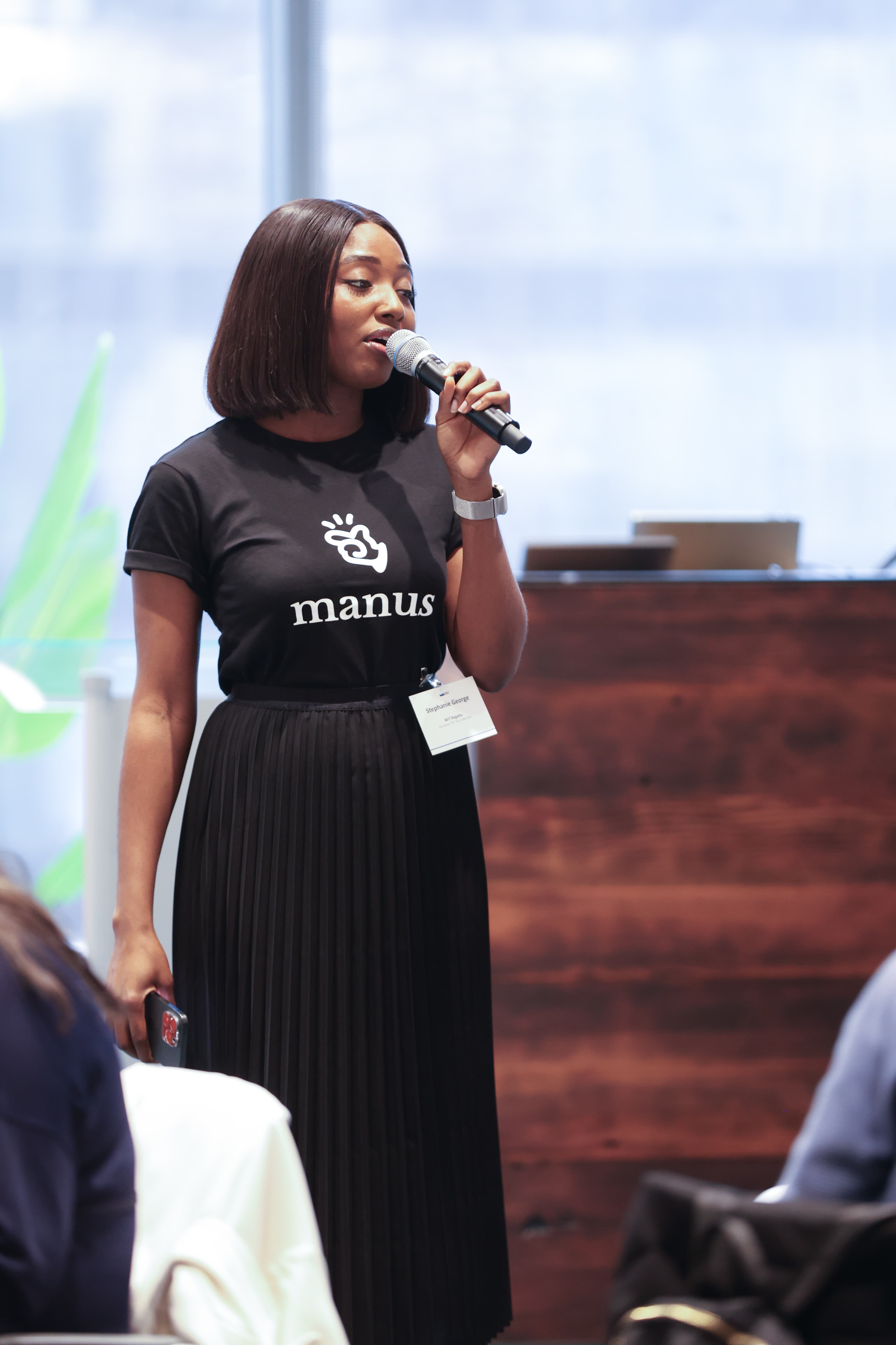 A speaker presenting at a Pioneer Lounge event